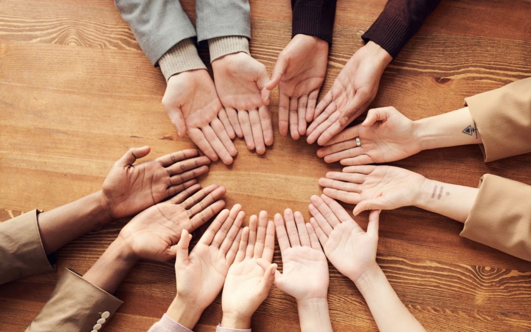 celebrating diversity by eliminating unconscious bias concept picture with hands of different people